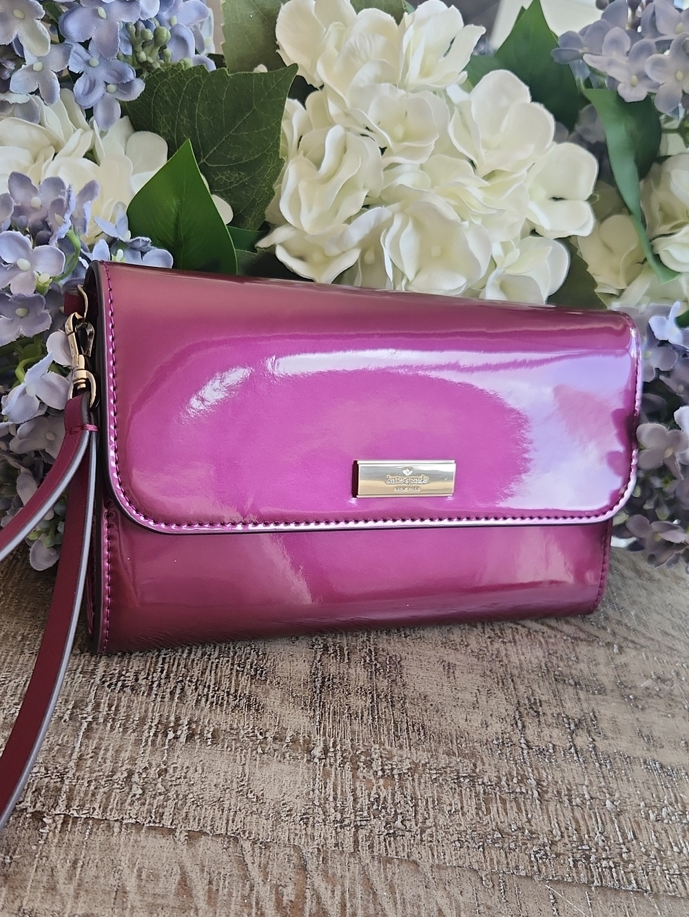 kate spade Patent Leather Wristlet in Purple Patent Leather. Fall Color!